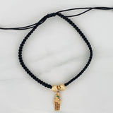 Pulsera Tejida Negra San Jose  1.45gr / 6mm Dos Oros Amarillo Blanco 18K &