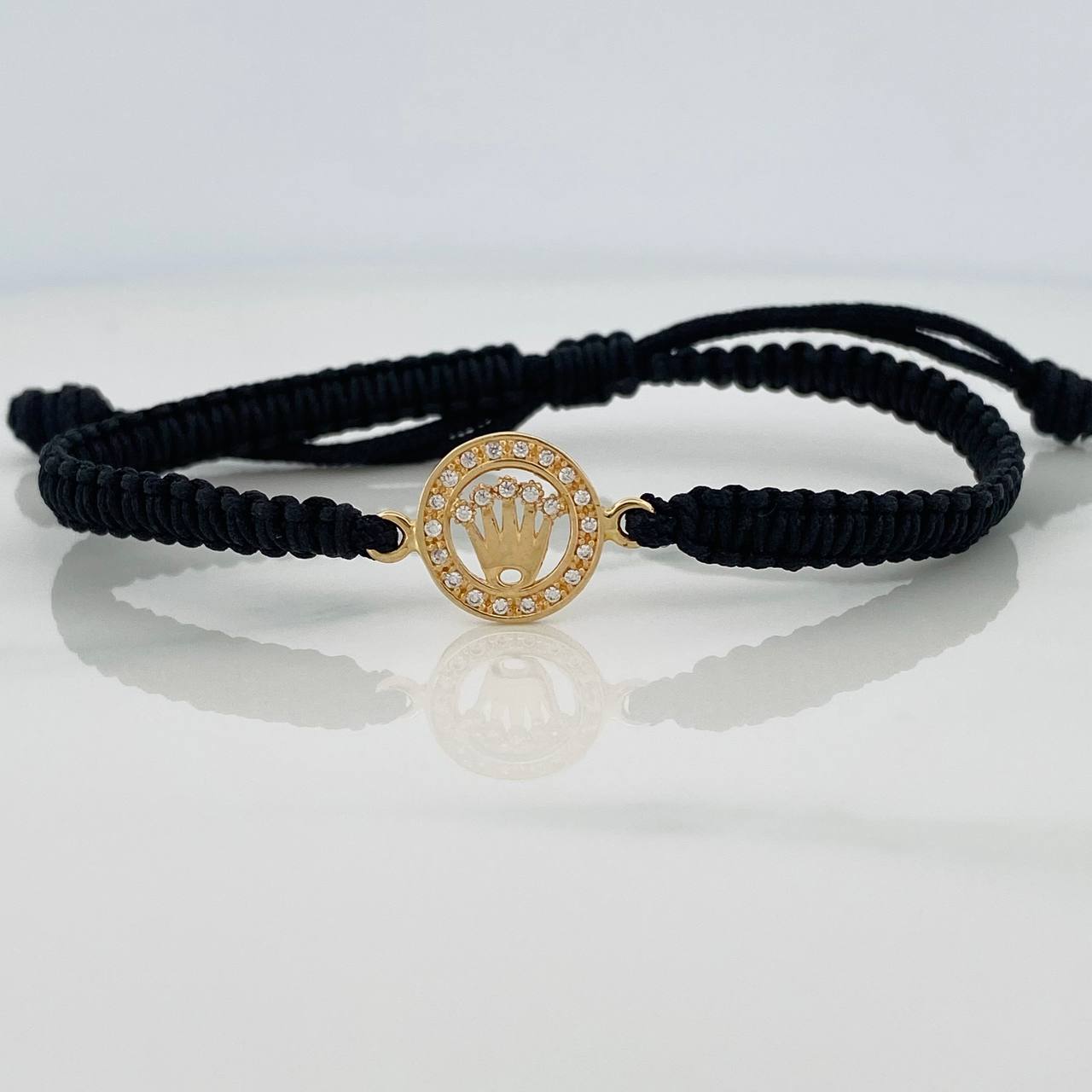 Pulsera Tejida Negra Corona 1.25gr / Oro Amarillo 18K &