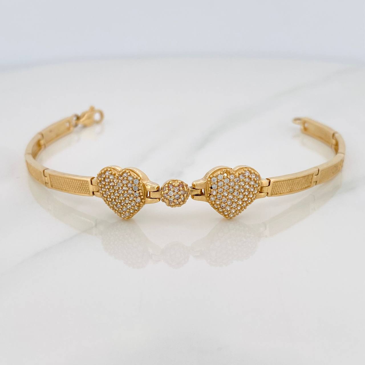 Pulso Corazones Reticulado 11.4gr / 16.7cm / Oro Amarillo 18K $