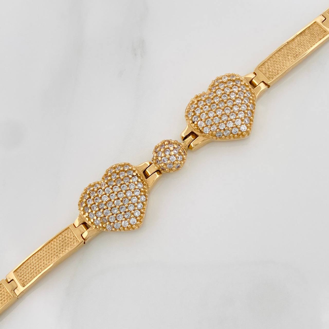 Pulso Corazones Reticulado 11.4gr / 16.7cm / Oro Amarillo 18K $