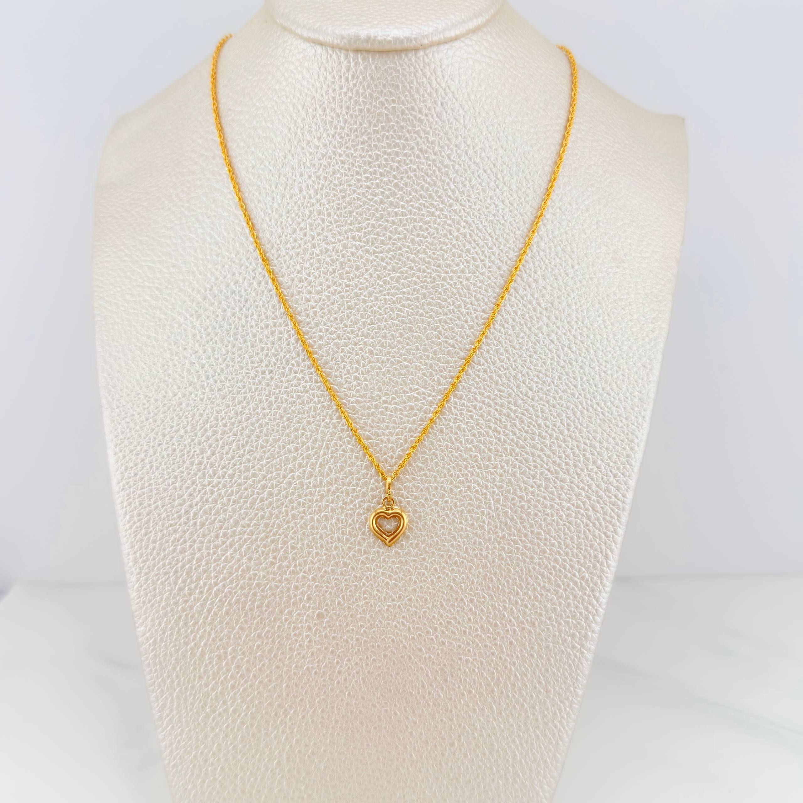 Set Cadena Lazo + Dije Silueta Corazon / 1,4 gr / 50.5 cm Oro Amarillo 18K