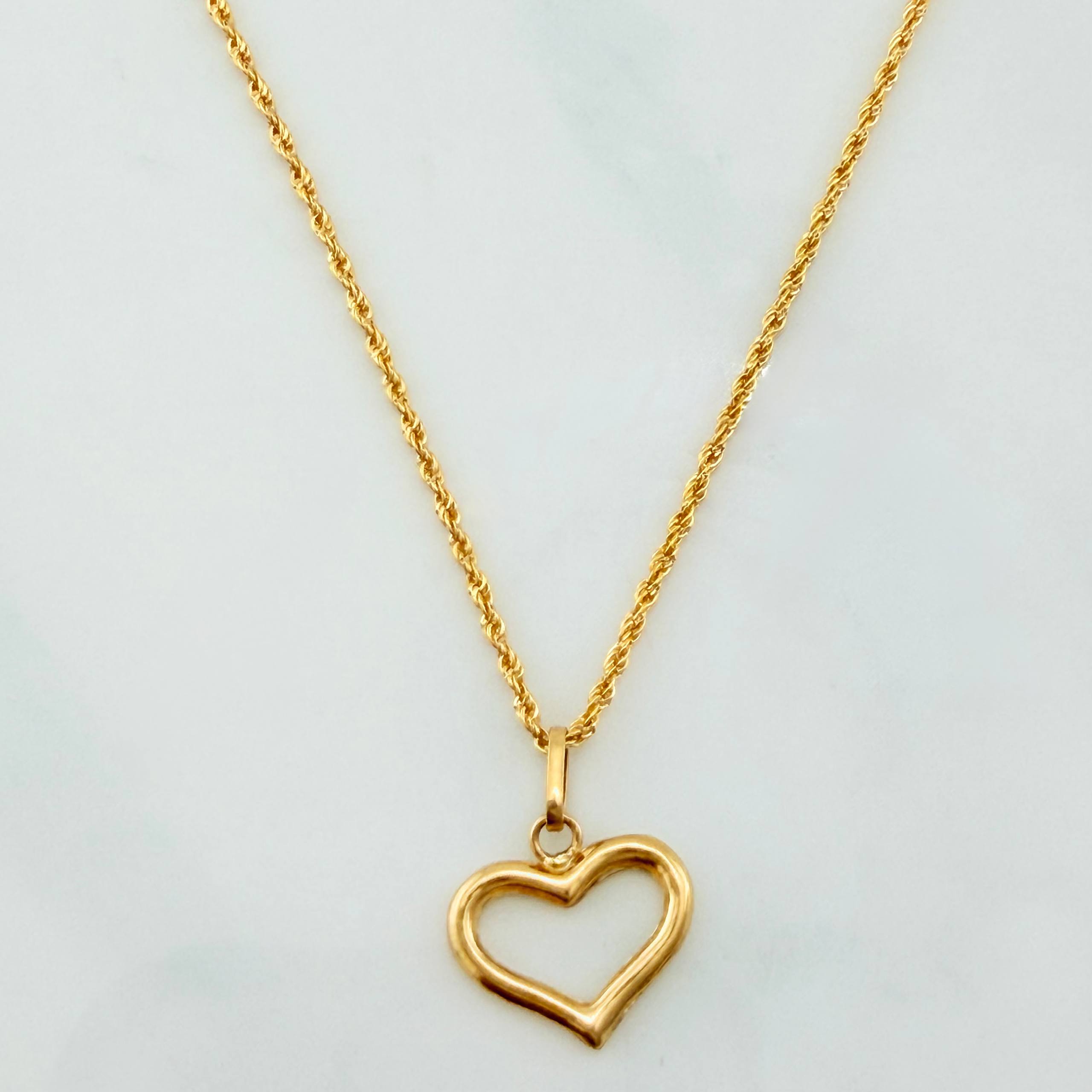 Set Cadena Lazo + Dije Silueta Corazon / 1,45 gr / 50 cm Oro Amarillo 18K
