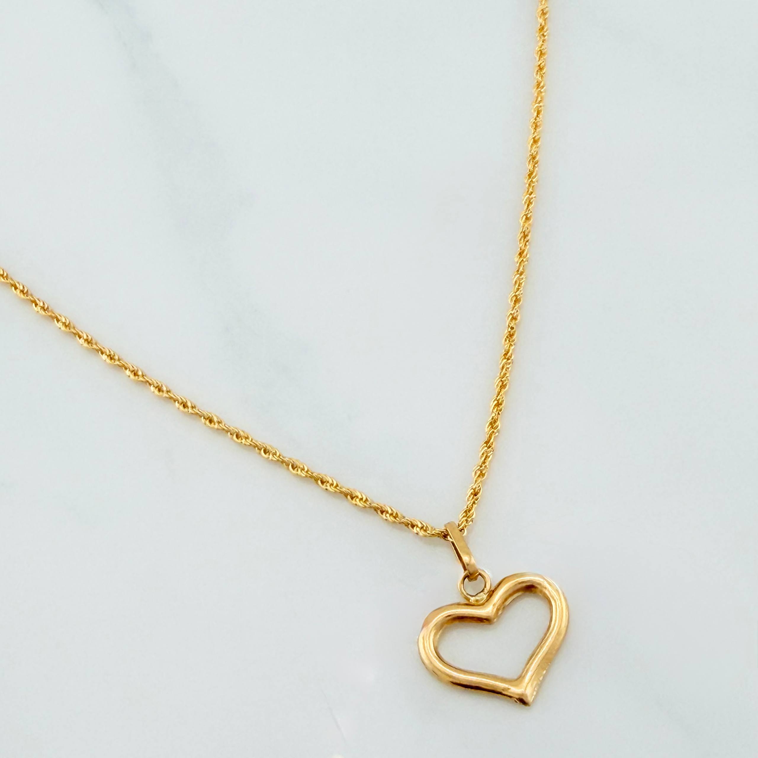 Set Cadena Lazo + Dije Silueta Corazon / 1,45 gr / 50 cm Oro Amarillo 18K