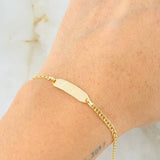 Pulso Bebé Aro Seguido Placa Rectangular Curva 1.35gr / 14cm-15cm / Oro Amarillo 18K ©