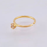 Piercing Chispa Circular 0.25gr / 1.2cm / Oro Amarillo 18K *