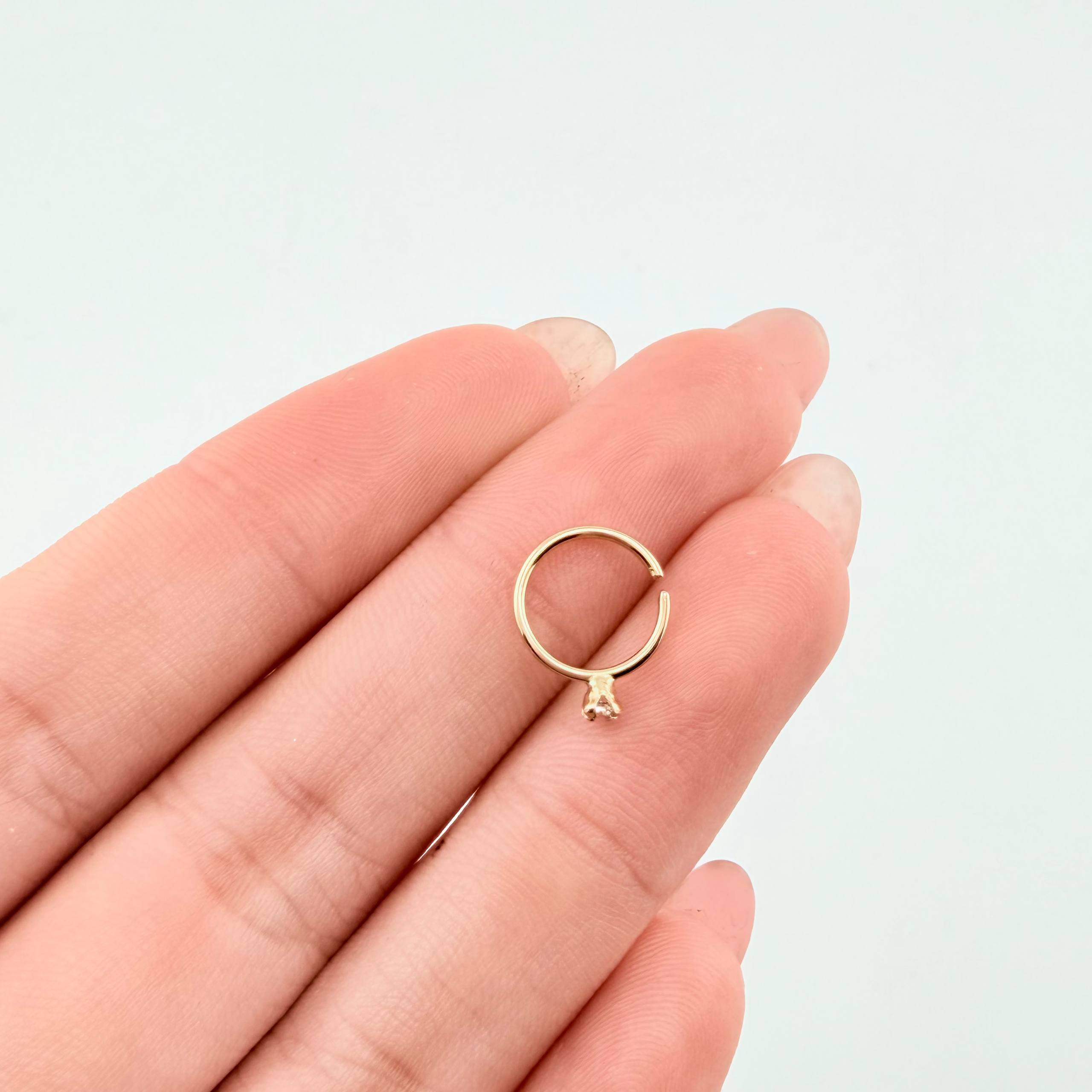 Piercing Chispa Circular 0.25gr / 1.2cm / Oro Amarillo 18K ©