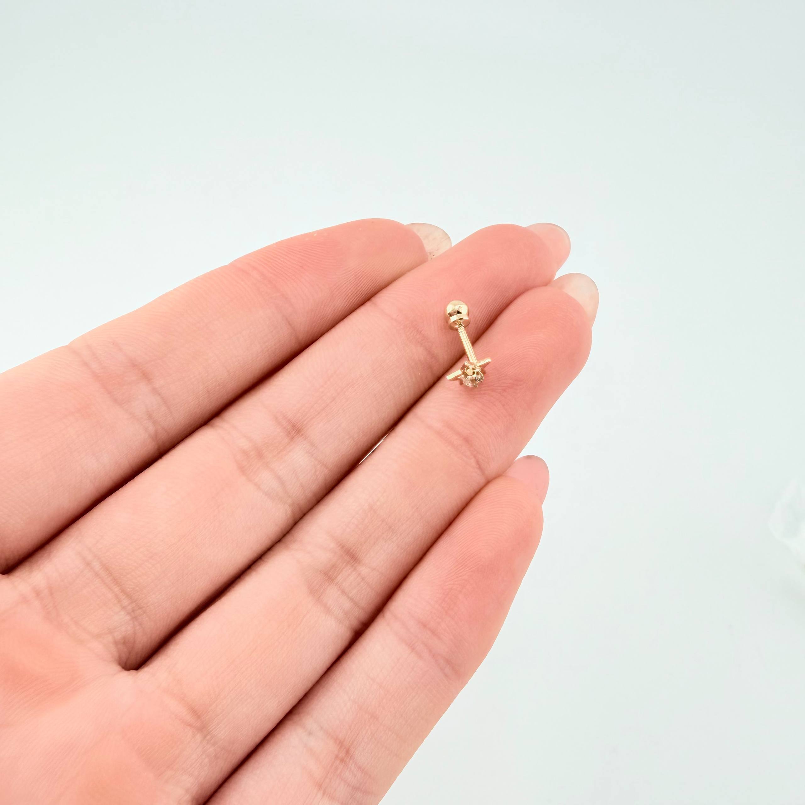 Piercing Chispa Estrella 0.3gr / 1.1cm / Oro Amarillo 18K *