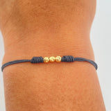 Pulsera Tejida Negra Bolas 0.15gr / Oro Amarillo 18K &