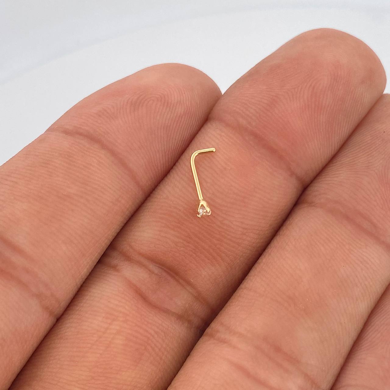 Piercing Chispa Cuatro Garras 0.1gr / 1cm / Oro Amarillo 18K $