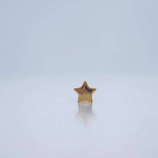 Piercing Estrella Plana 0.25gr / 1cm / Oro Amarillo 18K $
