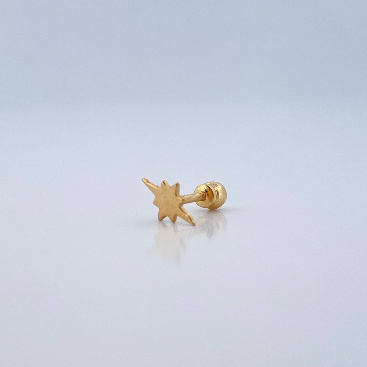 Piercing Estrella Cardinal 0.3gr / 1cm / Oro Amarillo 18K $
