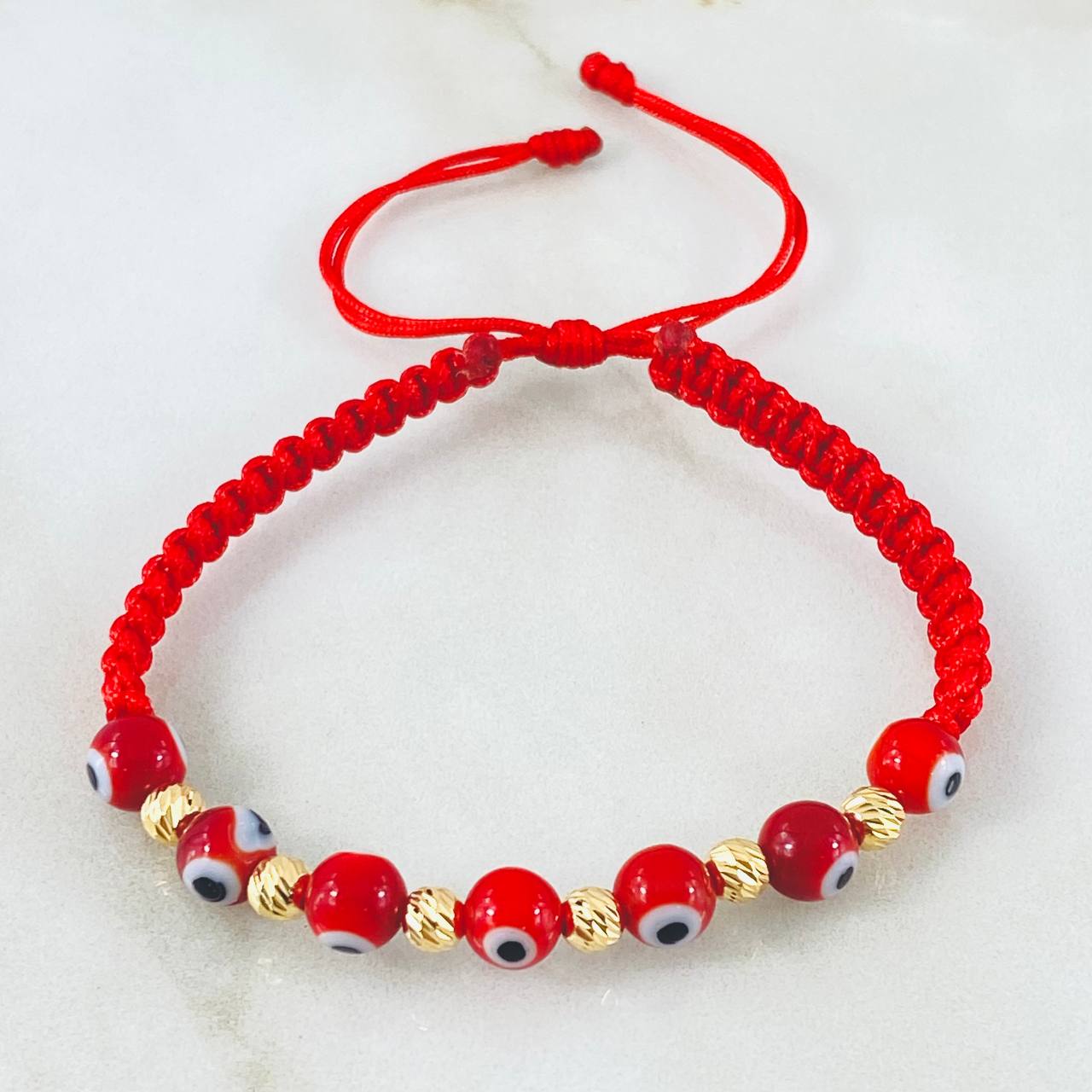 Pulsera Roja Ojos Turcos 0.65gr / Oro Amarillo 18K (A.C)