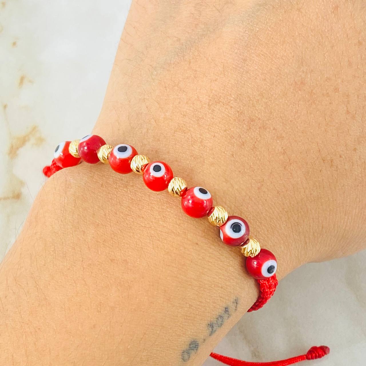 Pulsera Roja Ojos Turcos 0.65gr / Oro Amarillo 18K (A.C)