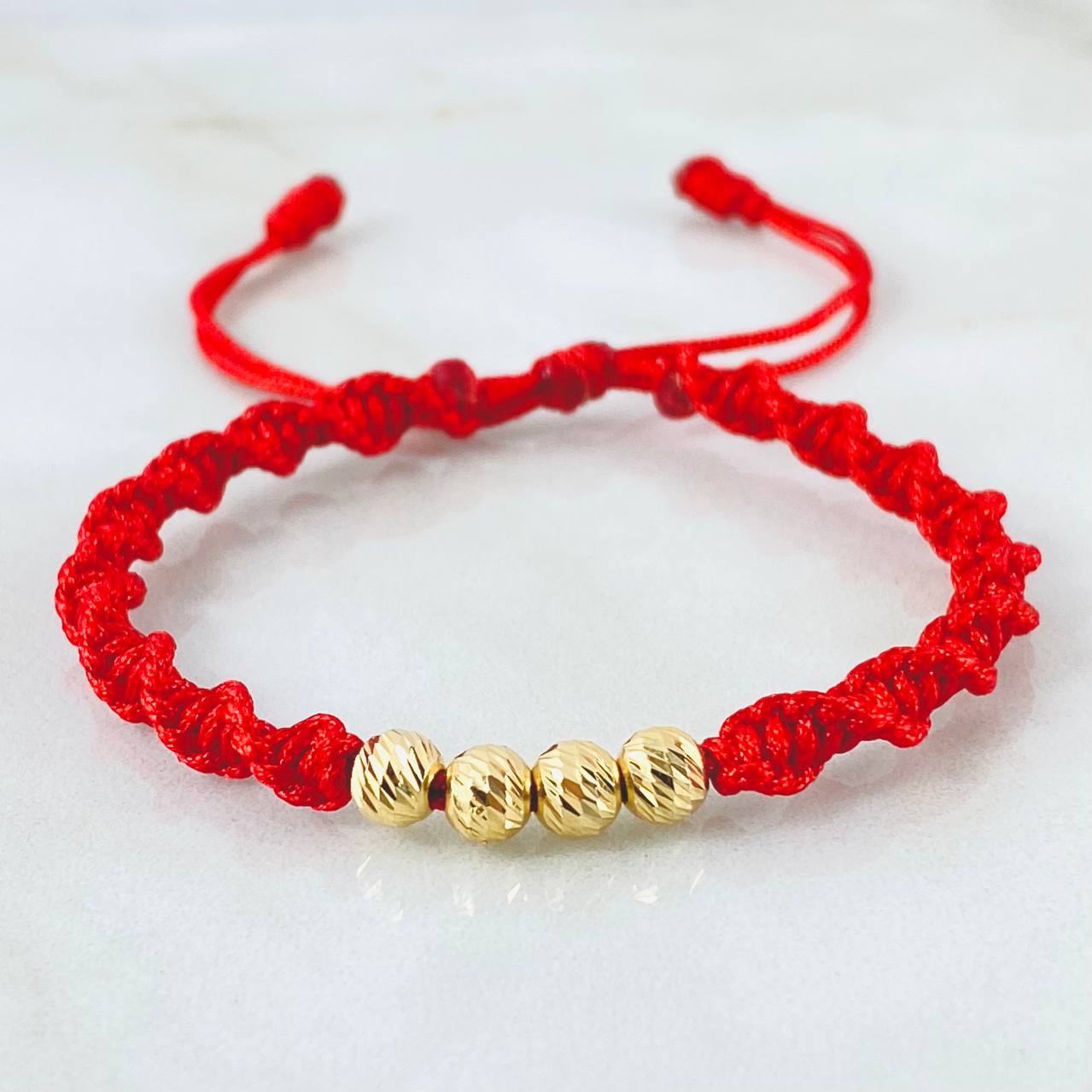 Pulsera Roja Bolas 0.75gr / Oro Amarillo 18K (A.C)