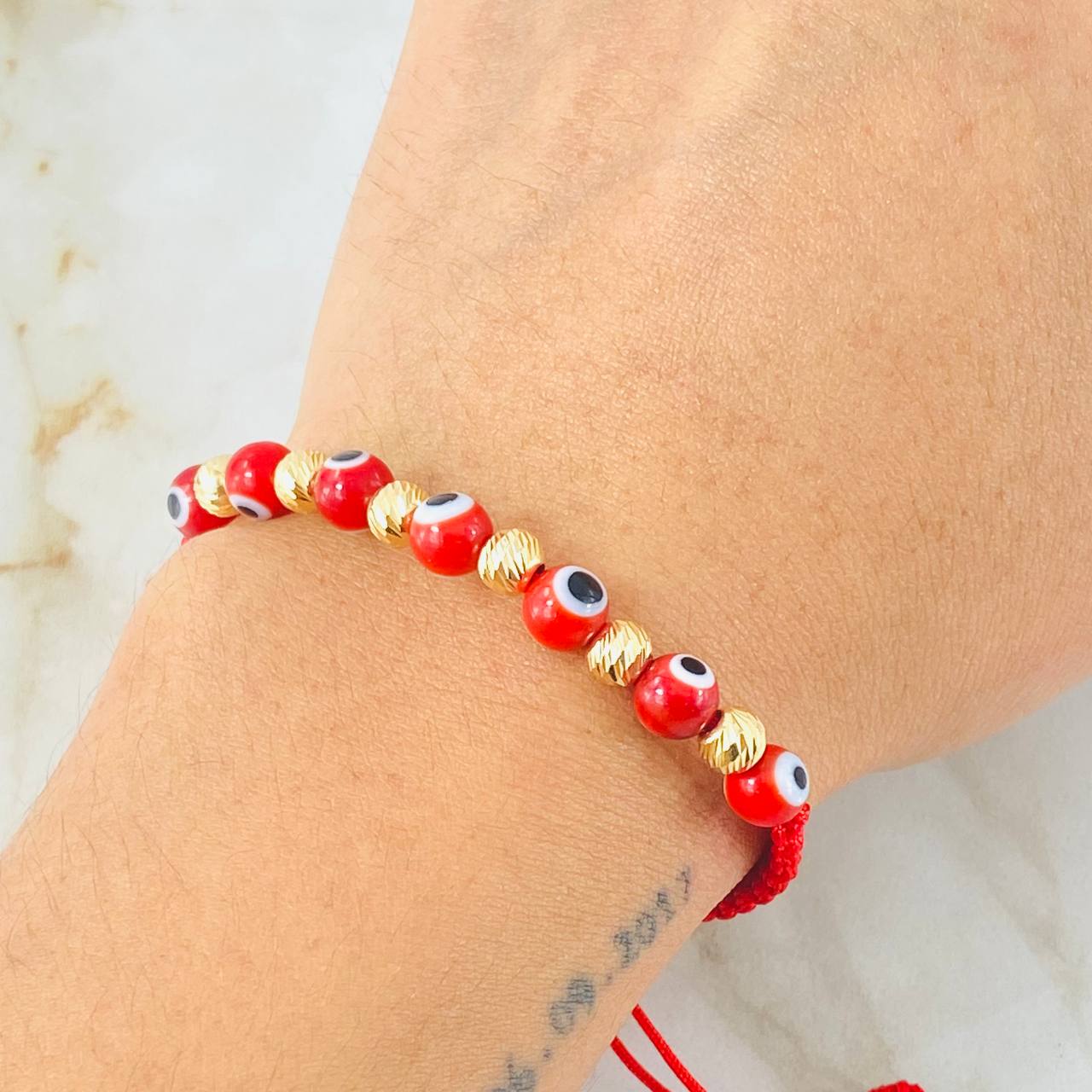 Pulsera Roja Ojos Turcos  1.1gr / Oro Amarillo 18K (A.C)