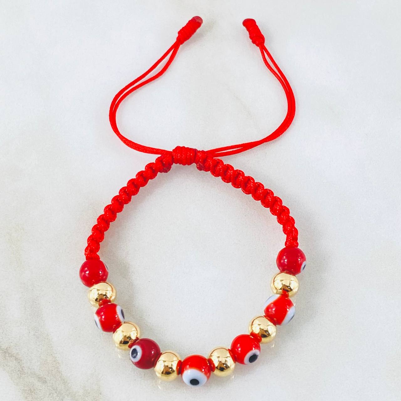 Pulsera Roja Ojos Turcos 1.25gr / Oro Amarillo 18K (A.C)