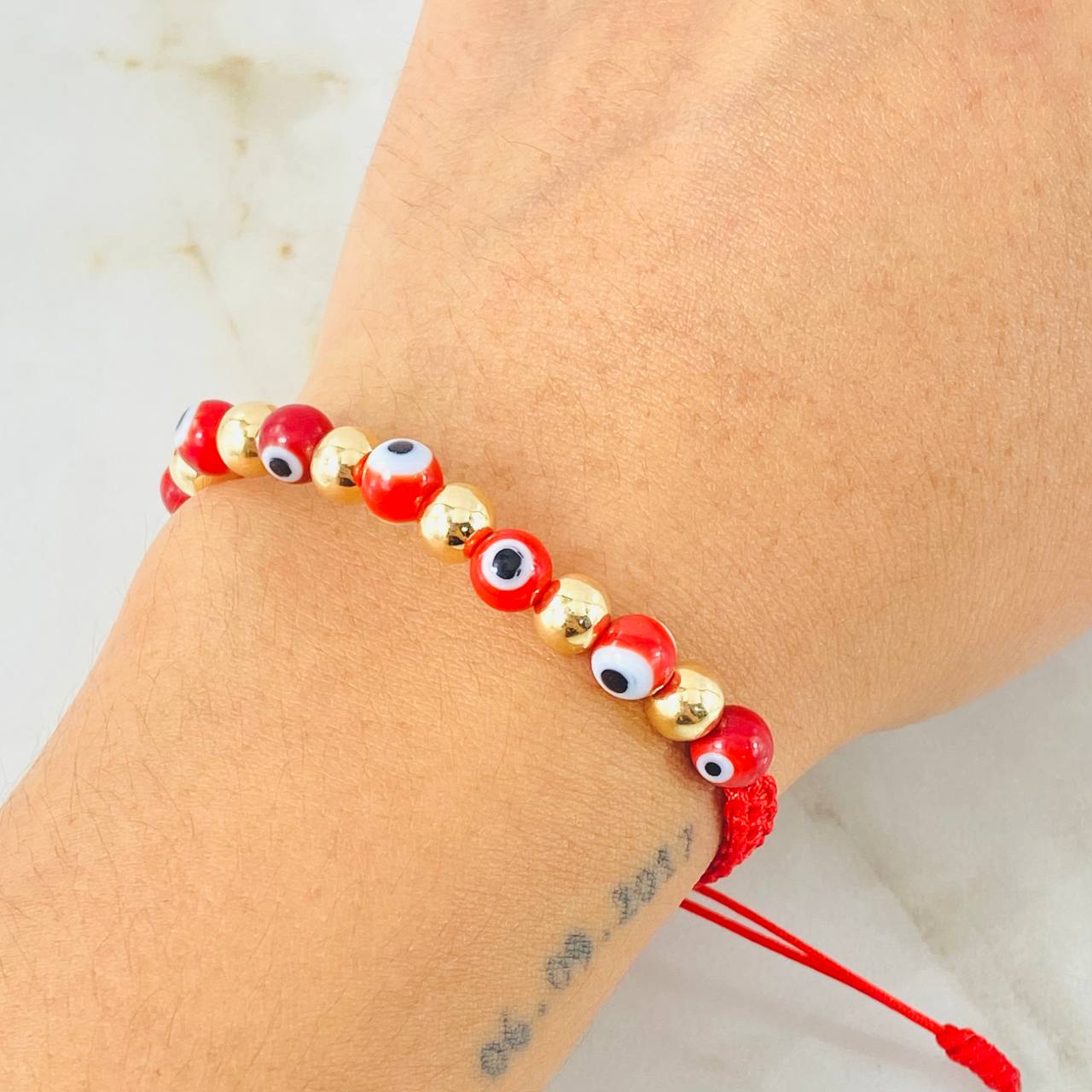 Pulsera Roja Ojos Turcos 1.25gr / Oro Amarillo 18K (A.C)