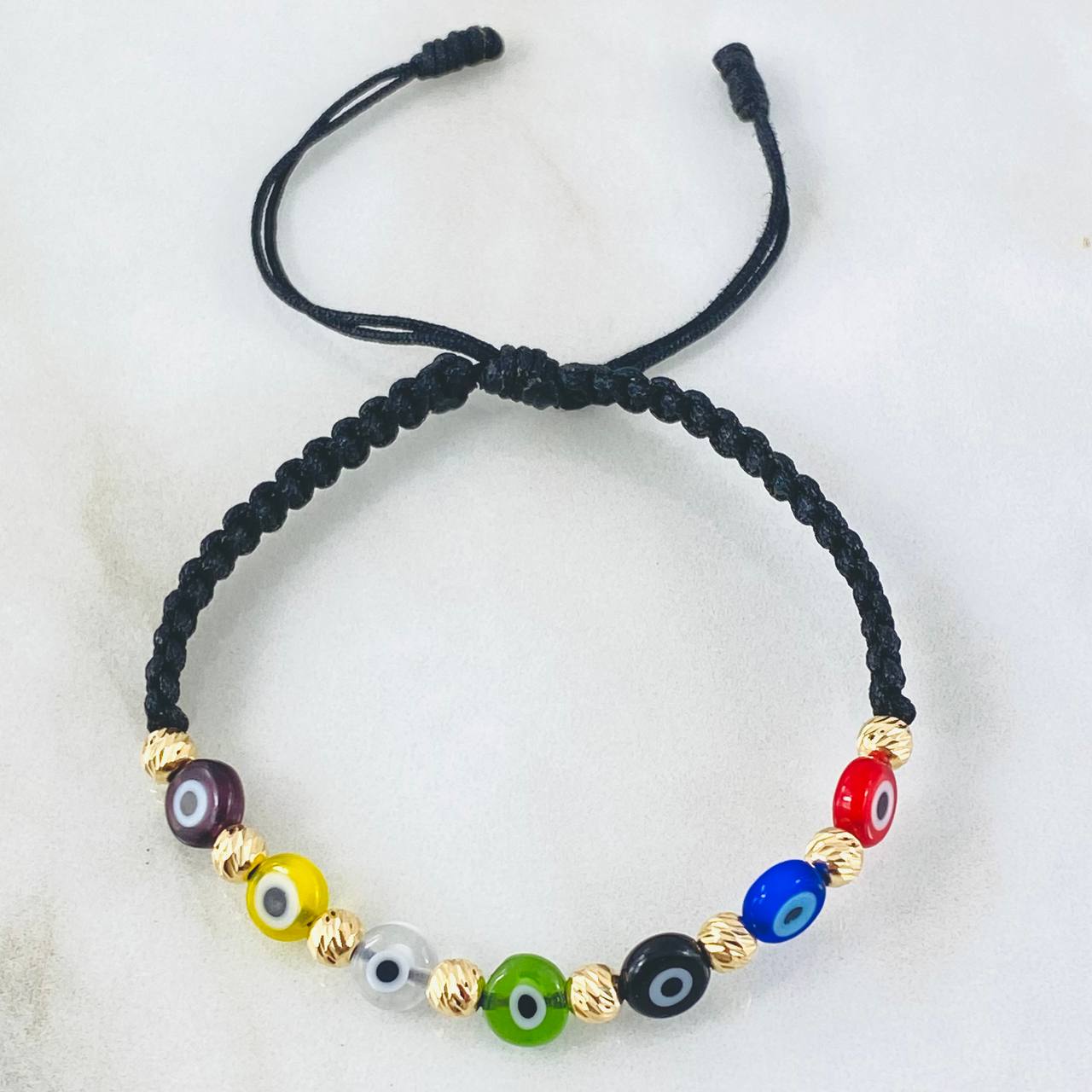 Pulsera Negra Ojos Turcos Colores 0.85gr / Oro Amarillo 18K (A.C)