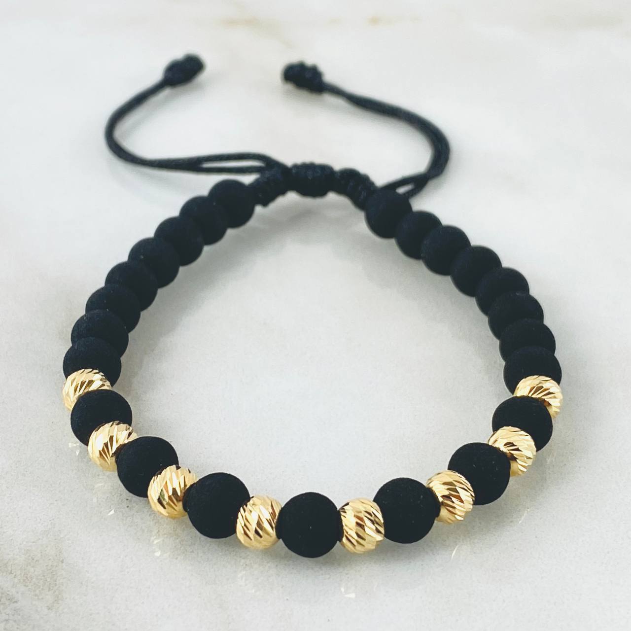 Pulsera Negra Bolas 1.4gr / Oro Amarillo 18K (A.C)