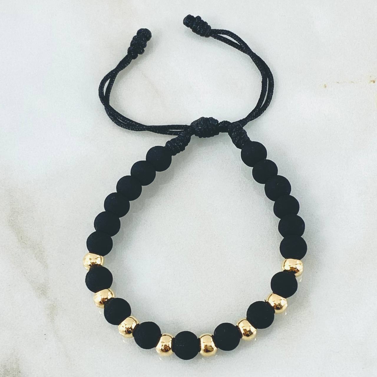 Pulsera Negra Bolas 1.2gr / Oro Amarillo 18K (A.C)