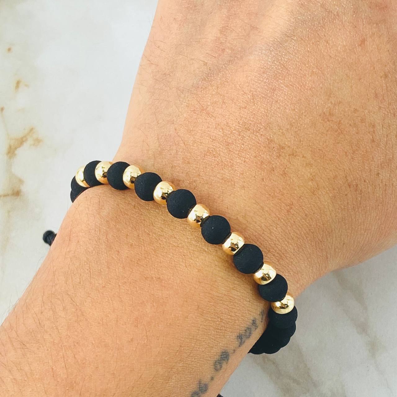 Pulsera Negra Bolas 1.2gr / Oro Amarillo 18K (A.C)