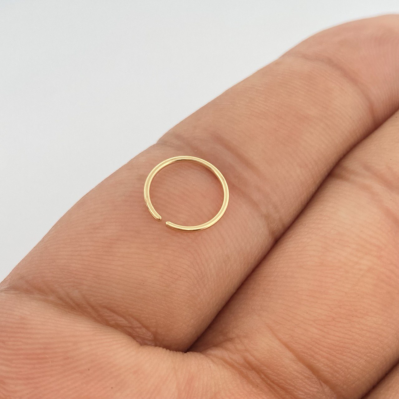Piercing Aro Liso 0.25gr / 1cm / Oro Amarillo 18K $