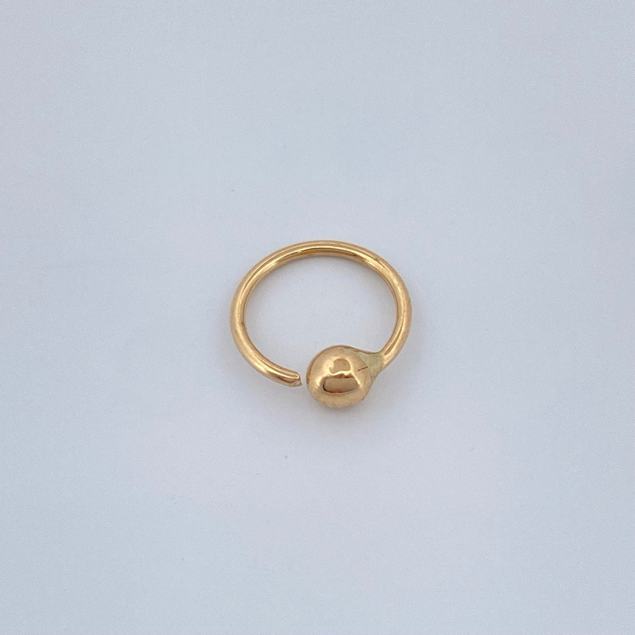 Piercing Aro Bola 0.25gr / 1cm / Oro Amarillo 18K $
