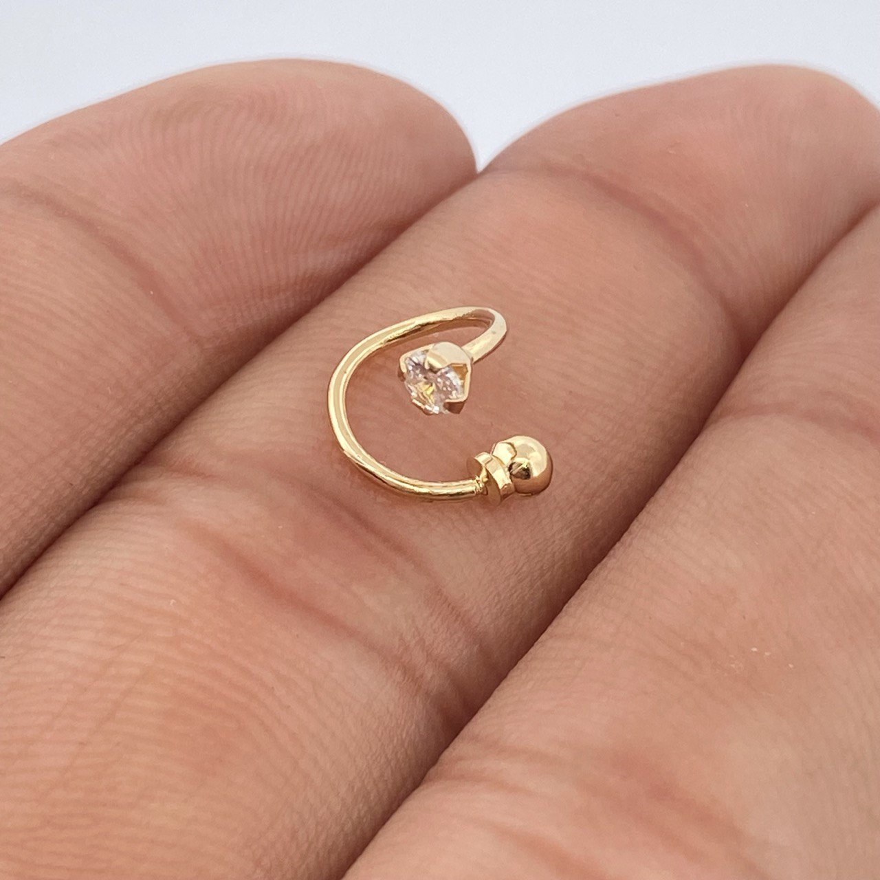 Piercing Espiral Cuatro Garras 0.5gr / 1cm / Oro Amarillo 18K $