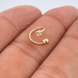 Piercing Espiral Cuatro Garras 0.5gr / 1cm / Oro Amarillo 18K $