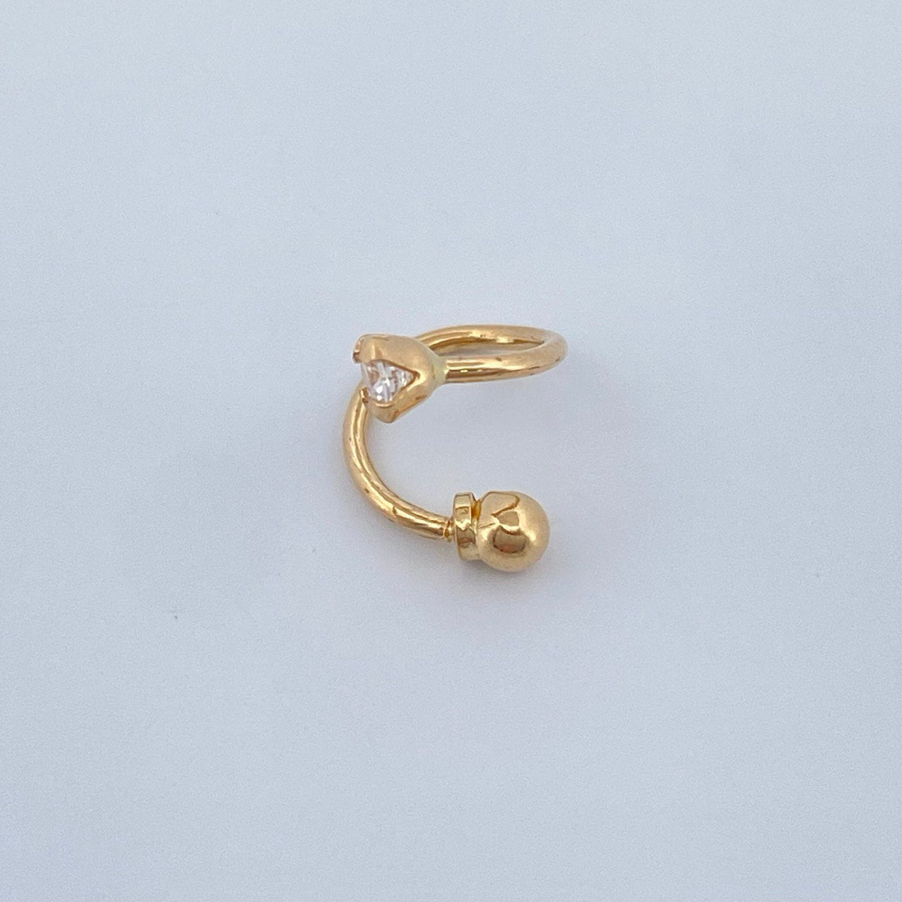Piercing Espiral Cuatro Garras 0.5gr / 1cm / Oro Amarillo 18K $