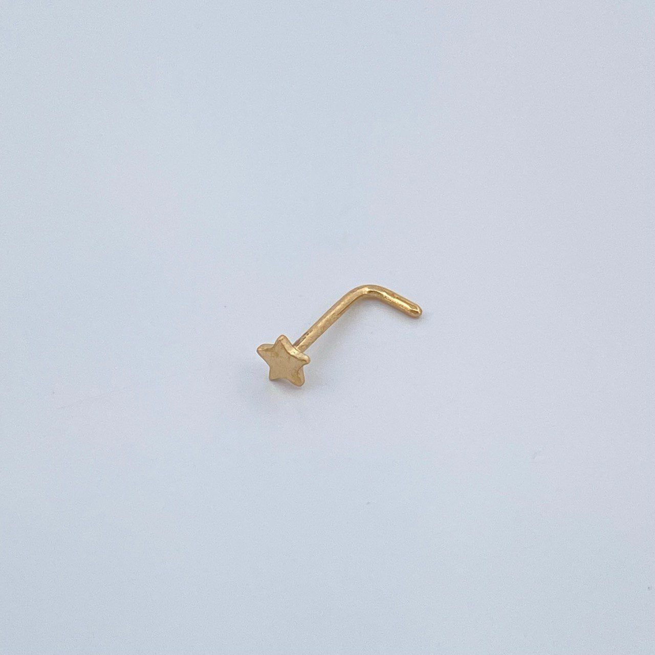 Piercing Chispa Estrella 0.1gr / 0.9cm / Oro Amarillo 18K $