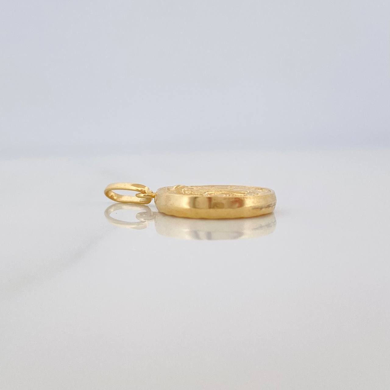 Dije San Benito 0.7gr / 2cm / Oro Amarillo 18K %