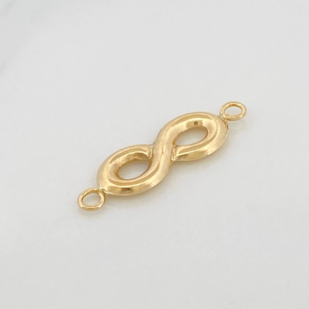 Herraje Infinito 0.65gr / 2.3cm / Oro Amarillo 18K