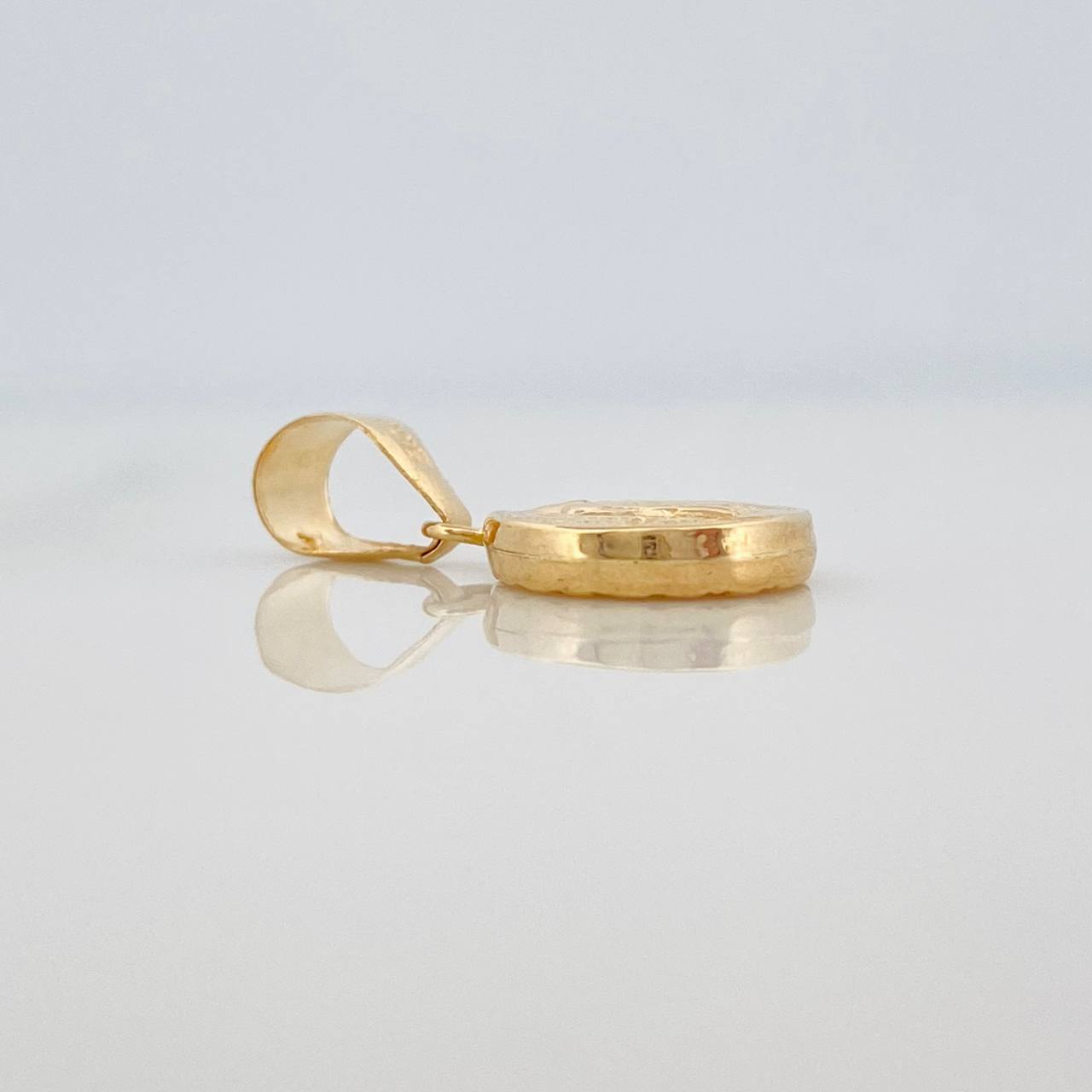Dije San Benito 0.6gr / 2cm / Oro Amarillo 18K %