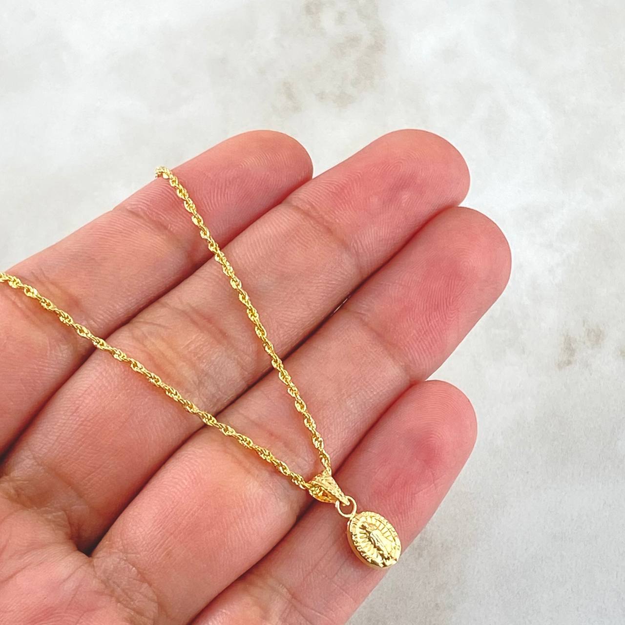 Set Cadena y Dije Lazo + Virgen Guadalupe 1.25gr / Oro 18K (Oferta) *