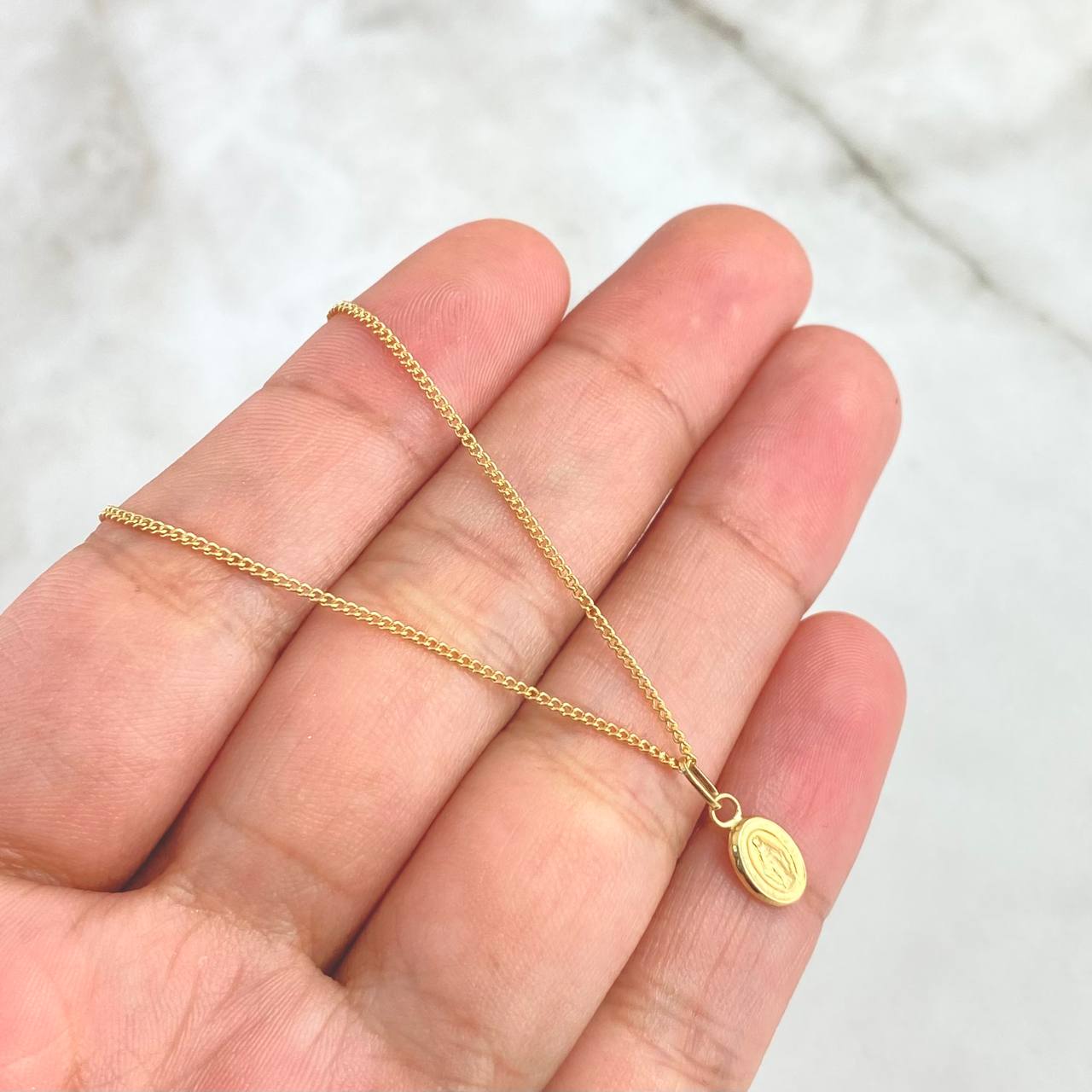 Cadena Mini Cubana 1.25gr / 60cm / 1mm + Dije Virgen Milagrosa 0.25gr / 1.3cm Oro Amarillo
