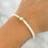 Pulsera Blanca Bola Deseos 0.15gr / 3mm Bolas Lisas 2 und Oro Amarillo ©