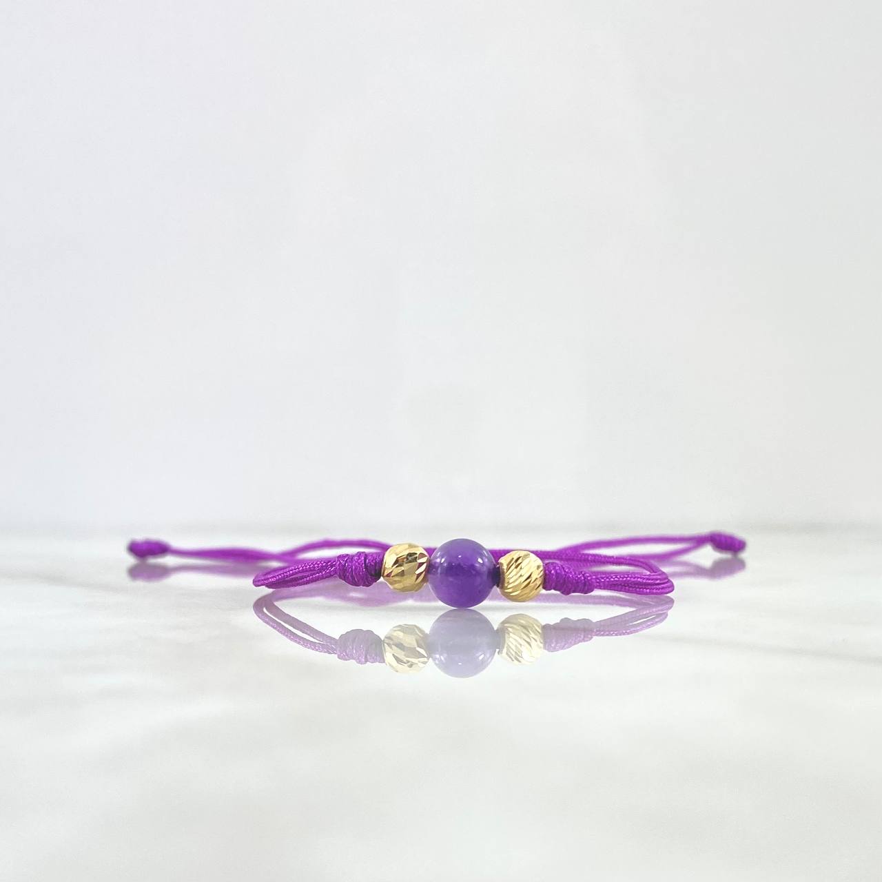 Pulsera Morada Bola Deseos 0.45gr / 5mm Bolas Diamantadas 2 und Oro Amarillo ©
