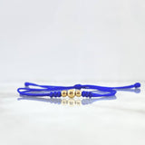 Pulsera Azul Trio Disimil 0.25gr / 4mm-3mm Bolas Lisas 3 und Oro Amarillo ©