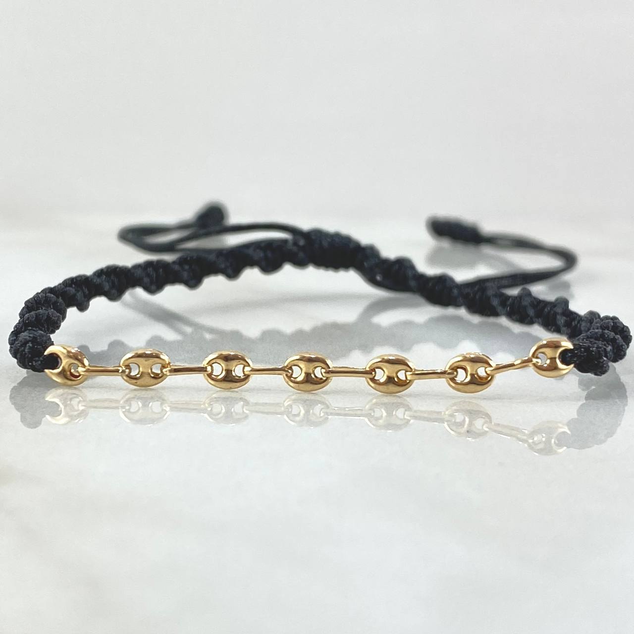 Pulsera Negra Herraje Retazo GC 0.4gr / Oro 18K ©