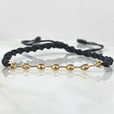Pulsera Negra Herraje Retazo GC 0.4gr / Oro 18K ©