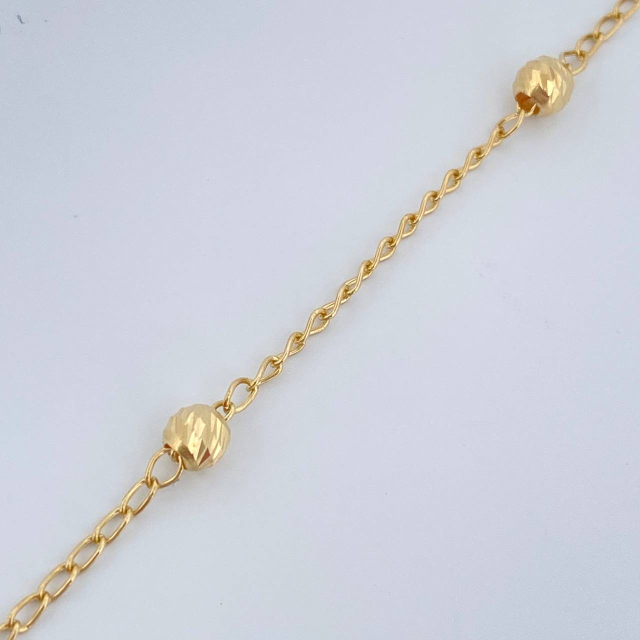 Tobillera Espiga 1.85gr / 24.8cm / 4mm Oro Amarillo 18K $