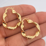 Candongas Remi 3.95gr / 2.8cm / Oro Amarillo 18K $