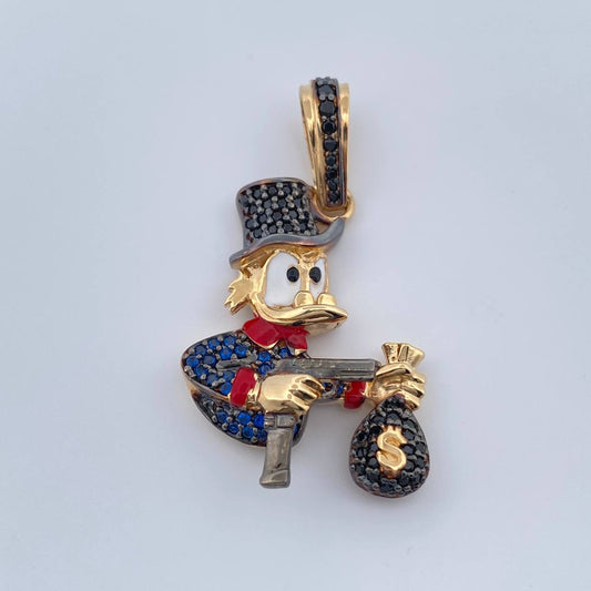 Dije Pato Pistola 6.05gr / 3.7cm / Dos Oros Negro Amarillo 18K $