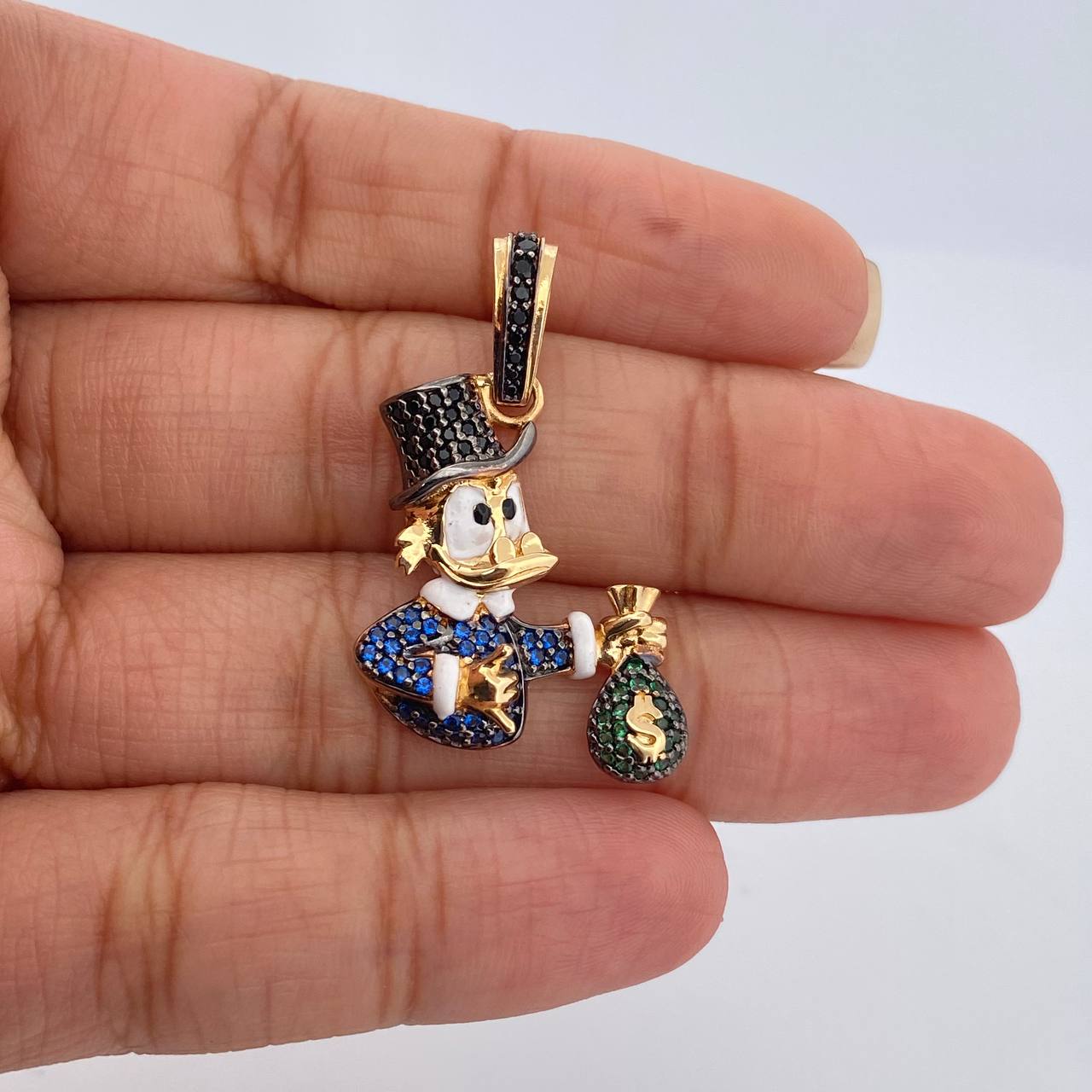 Dije Pato Bolsa De Dinero 5.5gr / 3.4cm / Dos Oros Negro Amarillo 18K $