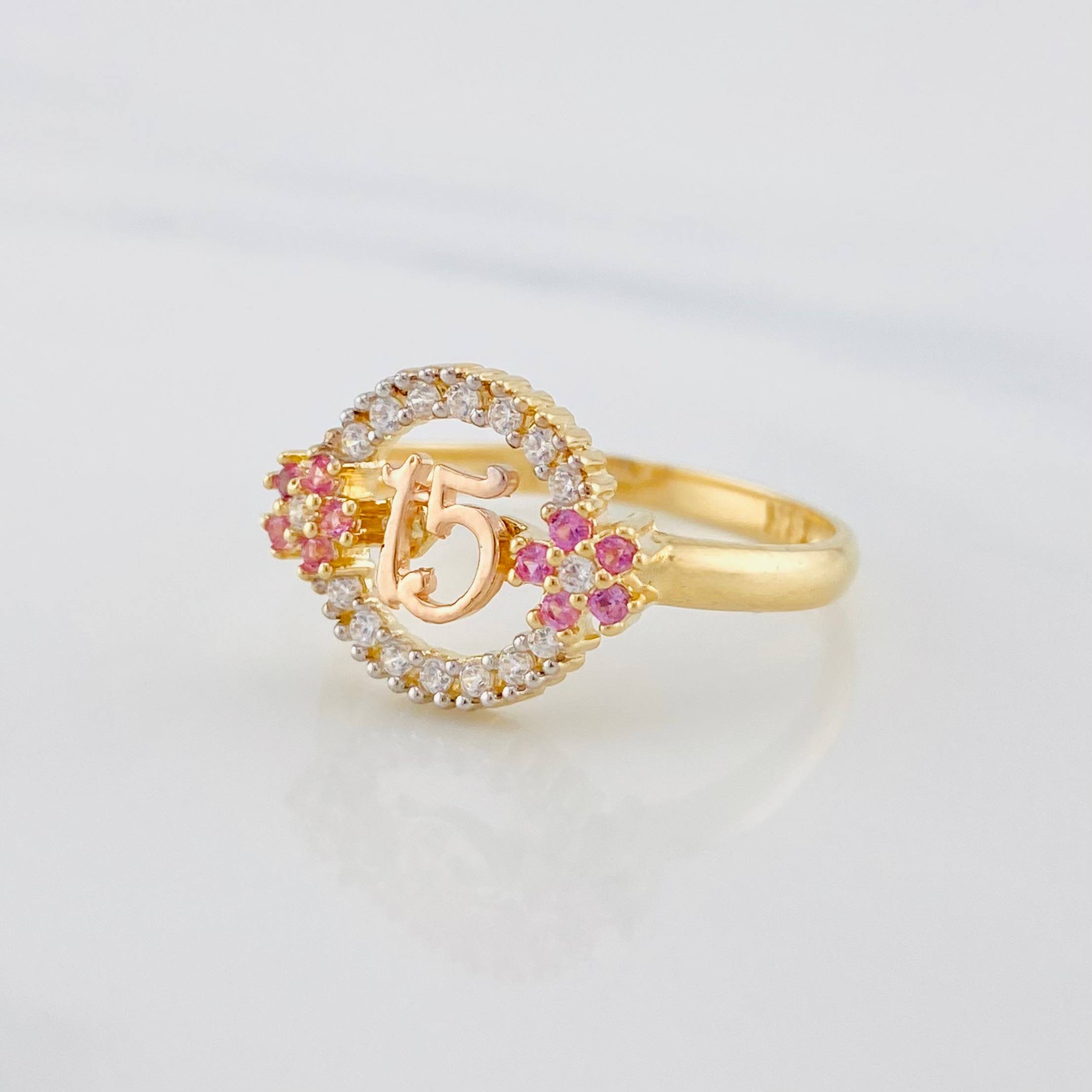 Anillo Circulo Flores 15´s 2.7g / T7 1/2 Tres Oros  18K