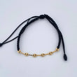 Pulsera Tejida Negra GC 0.6gr / Oro Amarillo 18K %