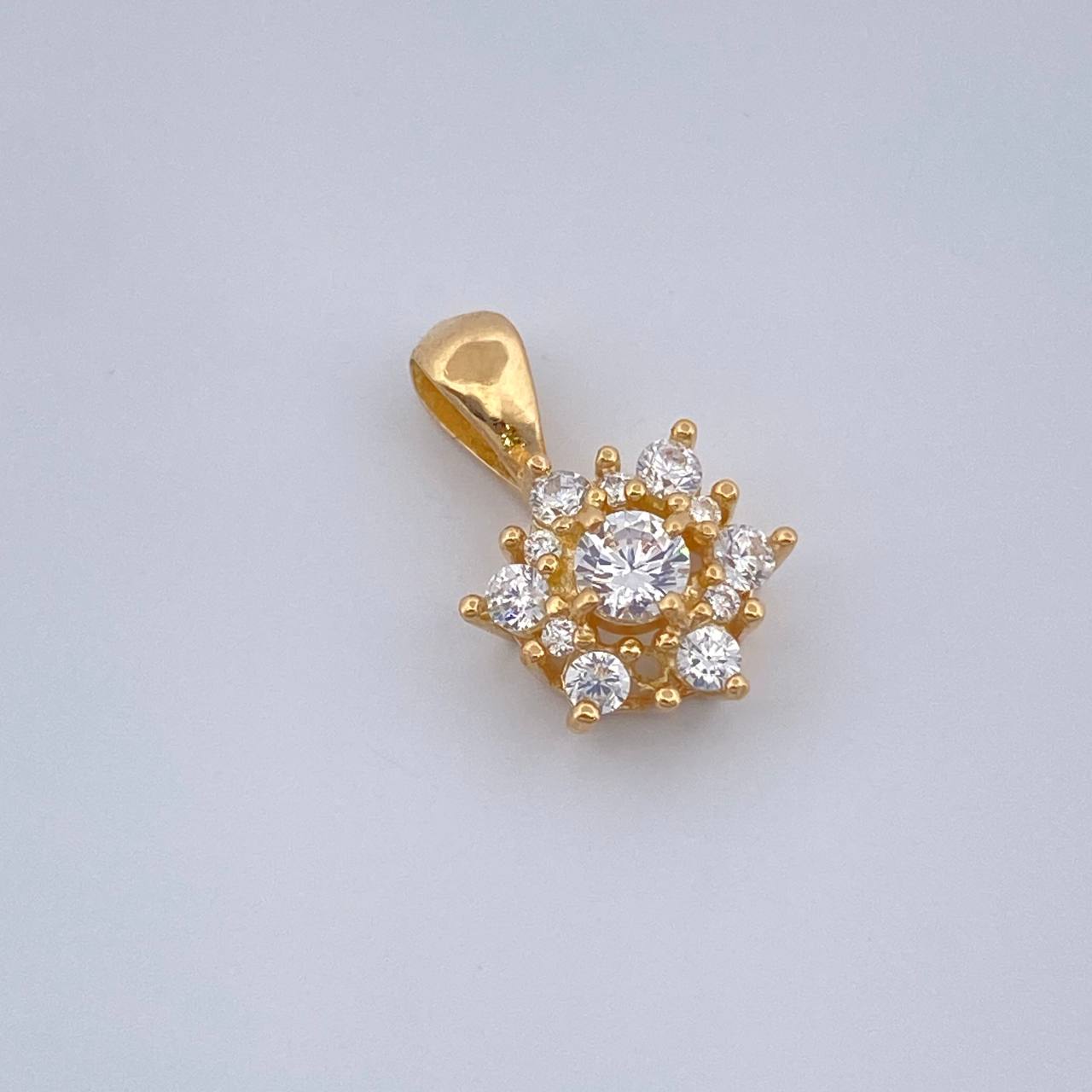 Dije Flor 0.85gr / 1.4cm-Oro Amarillo 18K %