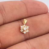 Dije Flor 0.85gr / 1.4cm-Oro Amarillo 18K %