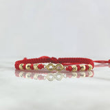 Pulsera Roja Infinito 1gr / 4mm Bolas Lisas Diamantadas 6 und Oro Amarillo ©